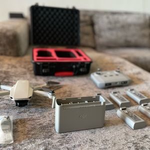 DJI Mini 2 Drone,  Protective Case, 5 DJI Intelligent Batteries, Charging Hub